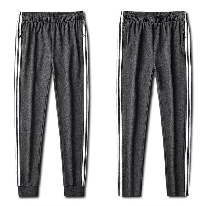Herren Slim-Fit Trackhose mit seitlichen Kontraststreifen, Reißverschlusstaschen und elastischem Bund – Sorevano