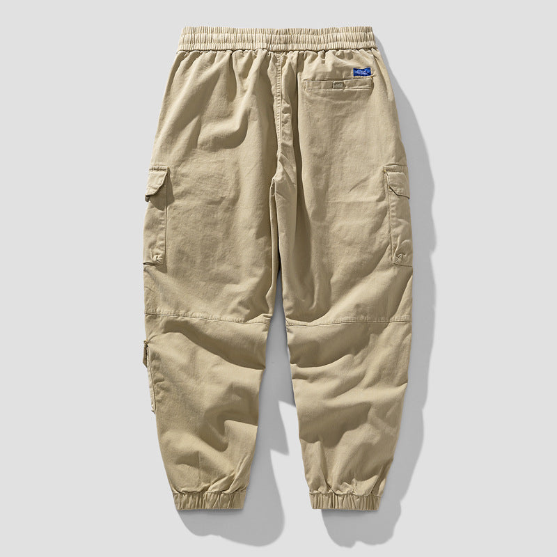 Herren Leichte Canvas-Cargohose im Joggerstil mit elastischem Bund, segmentierten Kniepaneelen und verdeckten Klappentaschen Echo Archiv