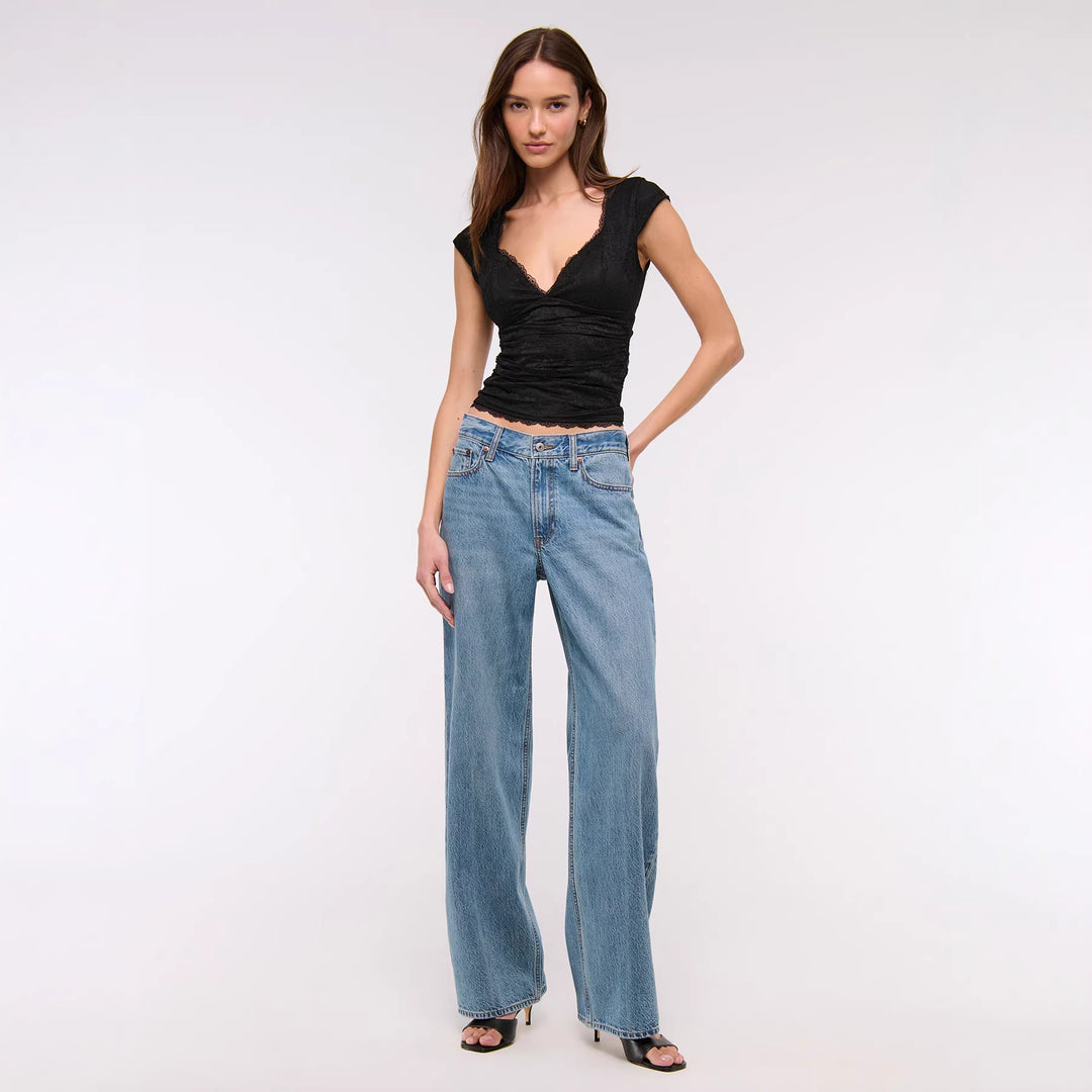 Damen Spitzen-Oberteil mit elegantem V-Ausschnitt und Rüschendetails Echo Archiv