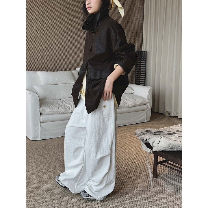 Damen Oversize Kunstleder-Hemdjacke mit breitem Kragen und Pattentaschen Echoarchiv