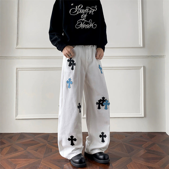 Damen Weitgeschnittene Denim-Hose mit kreativem Kreuzdesign Echoarchiv
