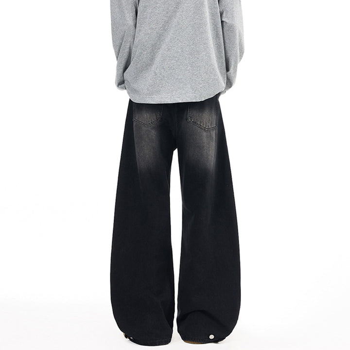 Herren Weitfallende Denim-Palazzo‑Hose mit skulpturalen Nahtpaneelen und bodenlangem Saum Echo Archiv