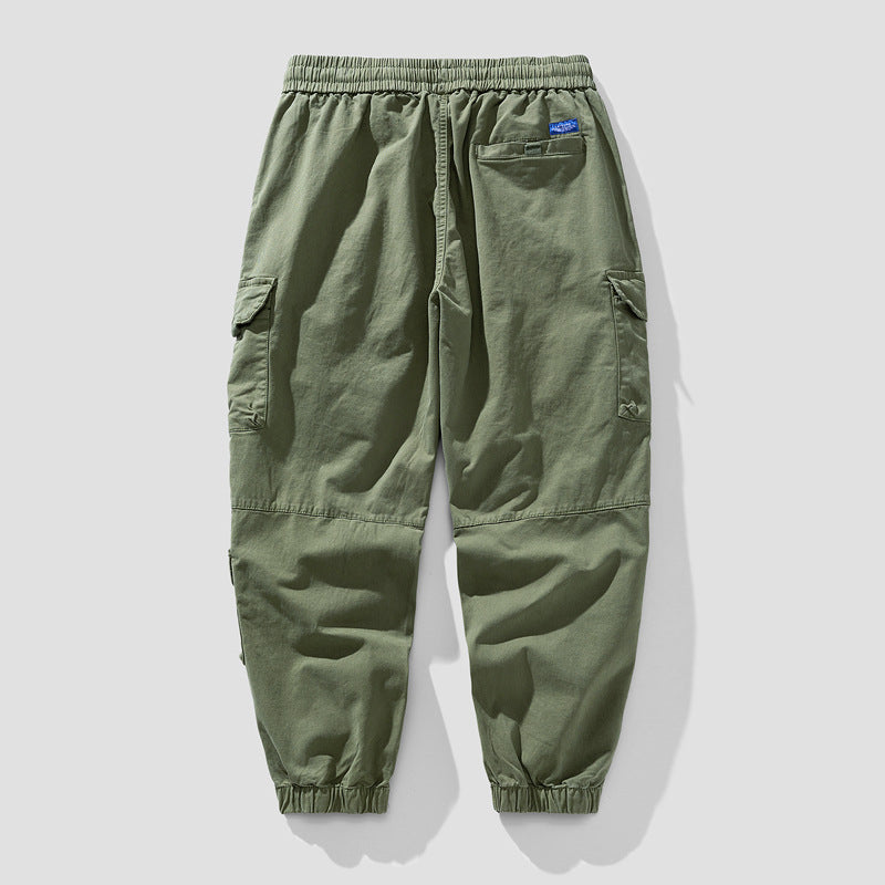 Herren Leichte Canvas-Cargohose im Joggerstil mit elastischem Bund, segmentierten Kniepaneelen und verdeckten Klappentaschen Echo Archiv
