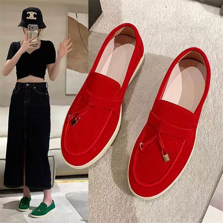 Damen Veloursleder Slipper mit dekorativer Quaste und profilierter Gummisohle Echo Archiv