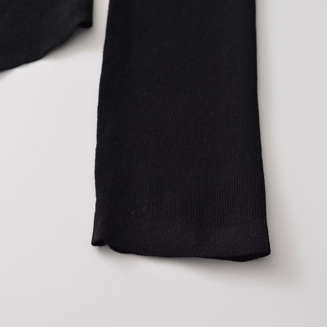 Damen Figurbetonte Rüschenbluse mit goldfarbenen Zierknöpfen und asymmetrischem Peplum Echoarchiv
