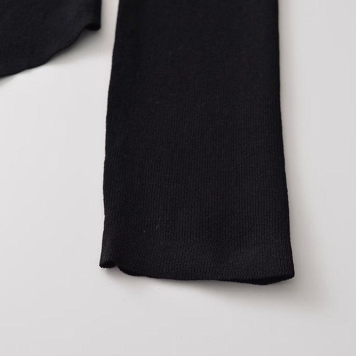 Damen Figurbetonte Rüschenbluse mit goldfarbenen Zierknöpfen und asymmetrischem Peplum Echoarchiv