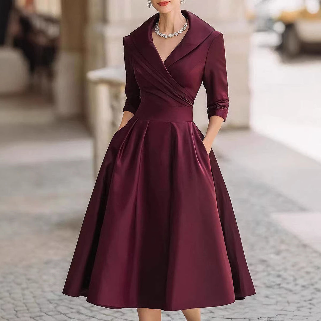 Damen nan elegantes Midikleid mit Wickeloberteil, Dreiviertelärmeln und Eingrifftaschen Echo Archiv