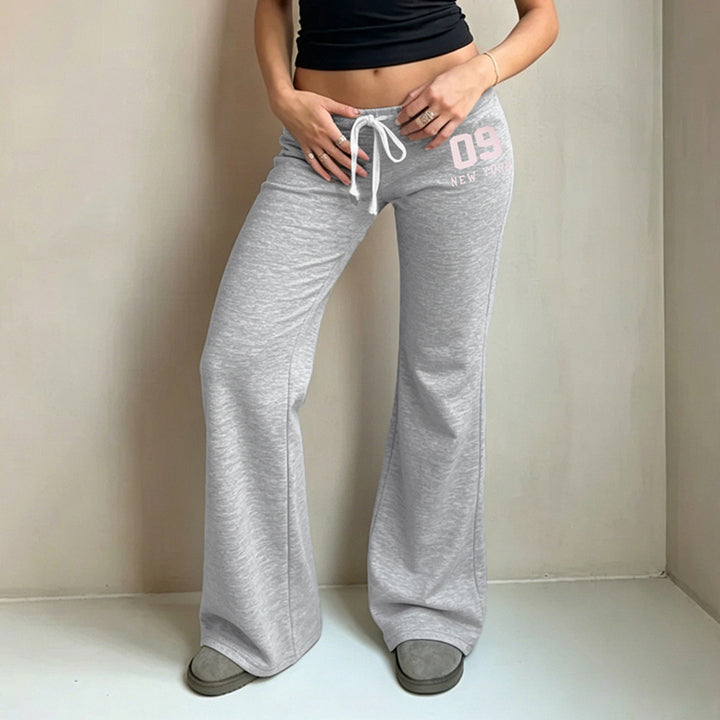 Damen Hochgeschnittene Sweat-Schlaghose mit Kordelbund und ausgestelltem Glockenbein Echo Archiv