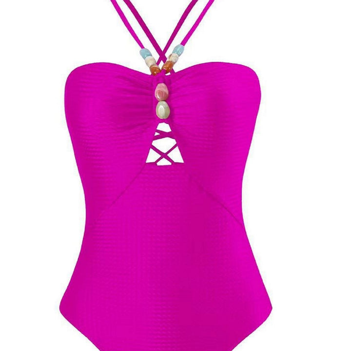 Damen Badeanzug mit elegantem Wickelrock und modischen Schmuckdetails Echo Archiv