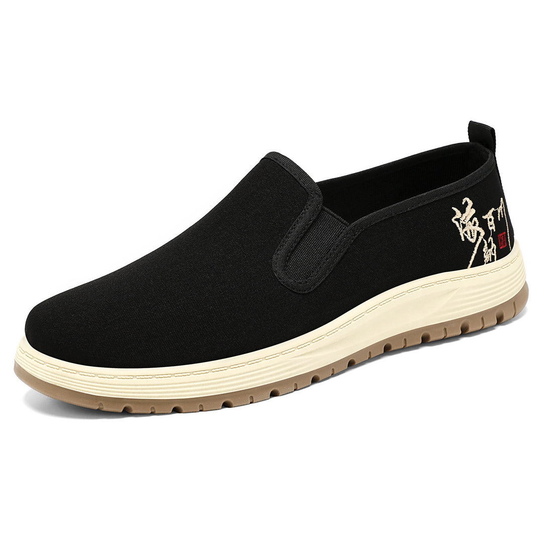 Herren nan nahtloser Canvas-Slip-On mit elastischem Einstieg, besticktem Fersenmotiv und rutschfester EVA-Laufsohle Echo Archiv