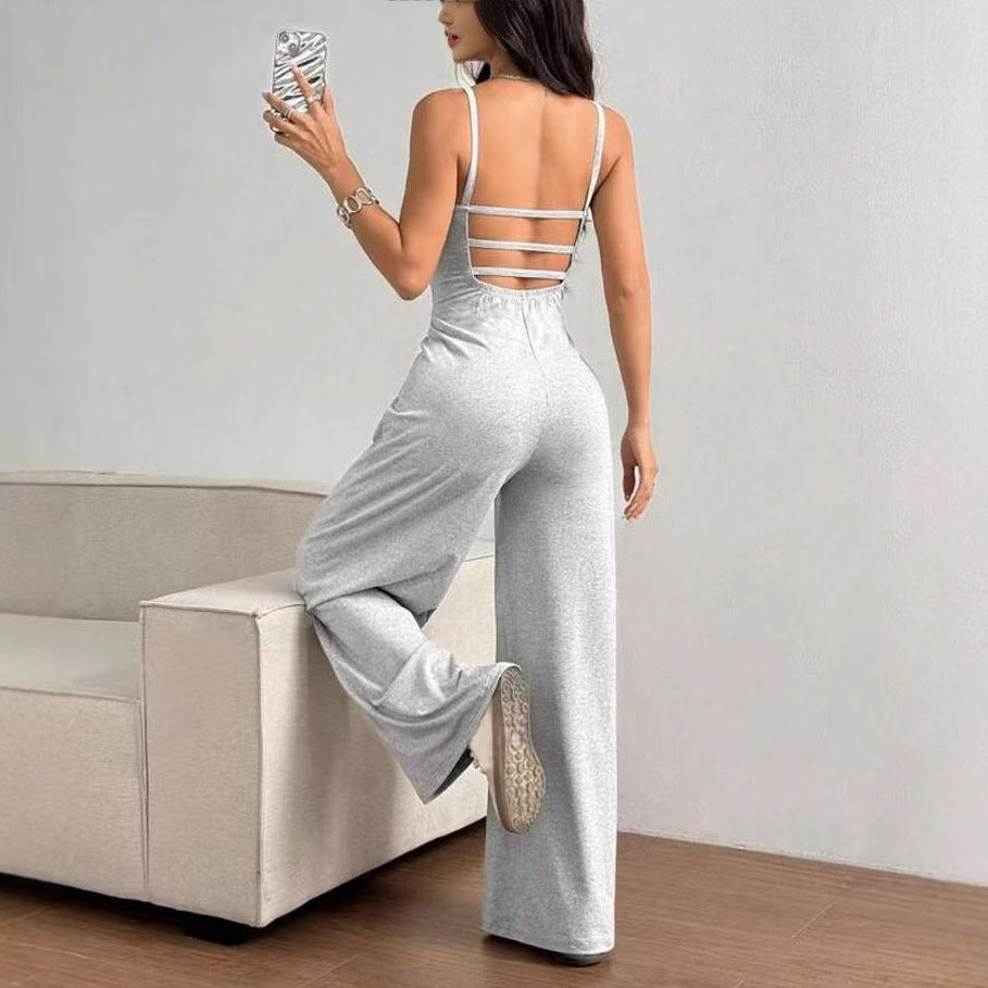 Damen Eleganter Jumpsuit mit weitgeschnittenen Beinen und schmeichelndem Oberteil Echo Archiv
