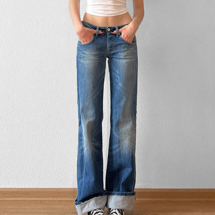 Damen hochtaillierte Schlagjeans mit dezenter Used-Waschung und ausgestelltem Bein – Dénora