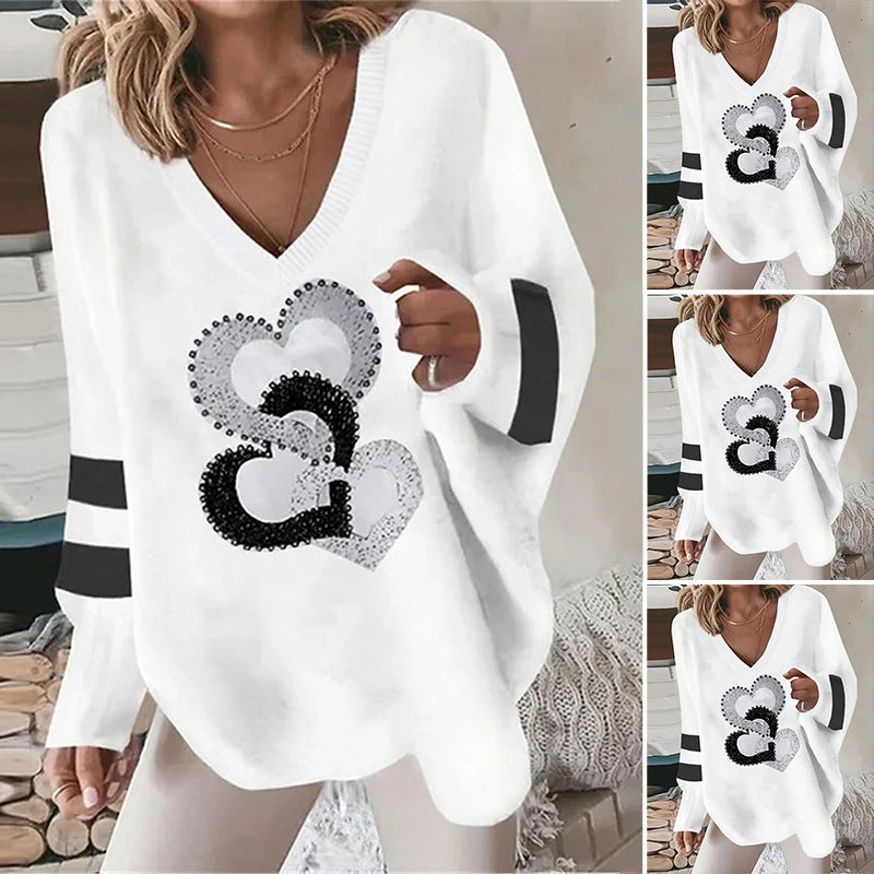 Damen nan übergroßer Strickpullover mit tiefem Ausschnitt Paillettenherz und Kontrastarmstreifen Echo Archiv
