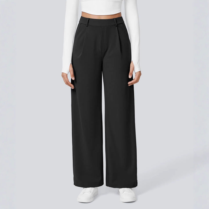 Damen nan hochgeschnittene Bundfaltenhose mit weitem Bein, Gürtelschlaufen und seitlichen Eingrifftaschen Echo Archiv