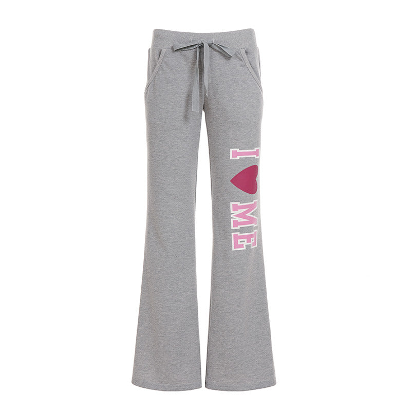 Damen nan weiche Flared-Jogginghose mit Kordelzug, Eingrifftaschen und auffälligem Love-Print Echo Archiv