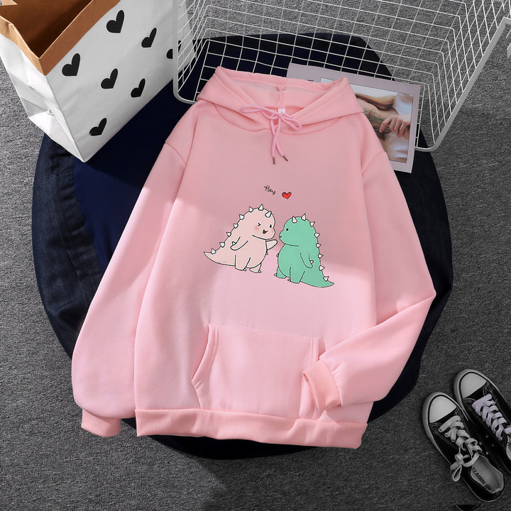 Damen Kapuzenpullover mit niedlicher Dinosaurierpärchen‑Illustration, Oversize‑Schnitt und Kängurutasche – Auréline