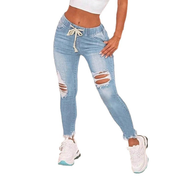 Damen Hochtaillierte Slim-Jogger-Jeans mit Destroyed-Einsätzen und Kordelzug Echo Archiv