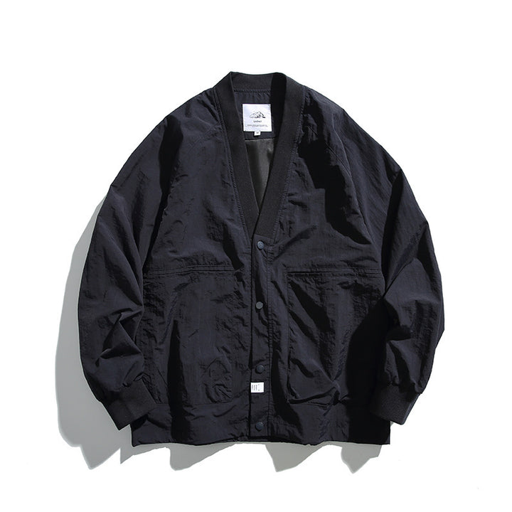Unisex Weitgeschnittene Leichte Übergangsjacke mit V-Ausschnitt und Druckknopfleiste Echo Archiv