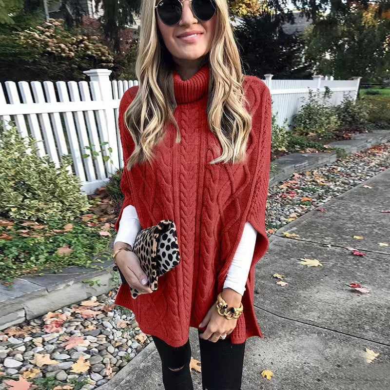 Damen nan kastiger Strickponcho mit hohem Rollkragen, Zopfstruktur und seitlichen Schlitzen Echo Archiv