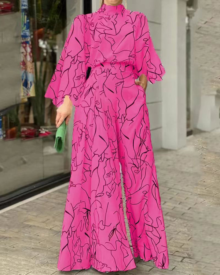 Damen Eleganter Longline Jumpsuit mit Stehkragen, Ballonärmeln und Seitentaschen Echoarchiv