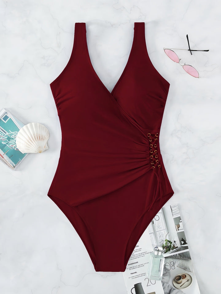 Damen Einteiliger Badeanzug mit raffiniertem Wickeldesign Echo Archiv