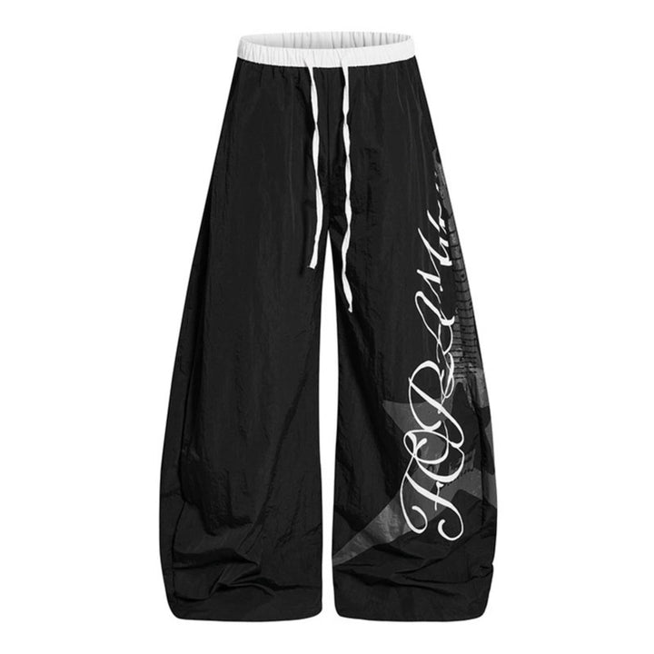 Damen Weite Palazzo-Hose mit Tunnelzugbund und großflächigem Statement-Print Echoarchiv
