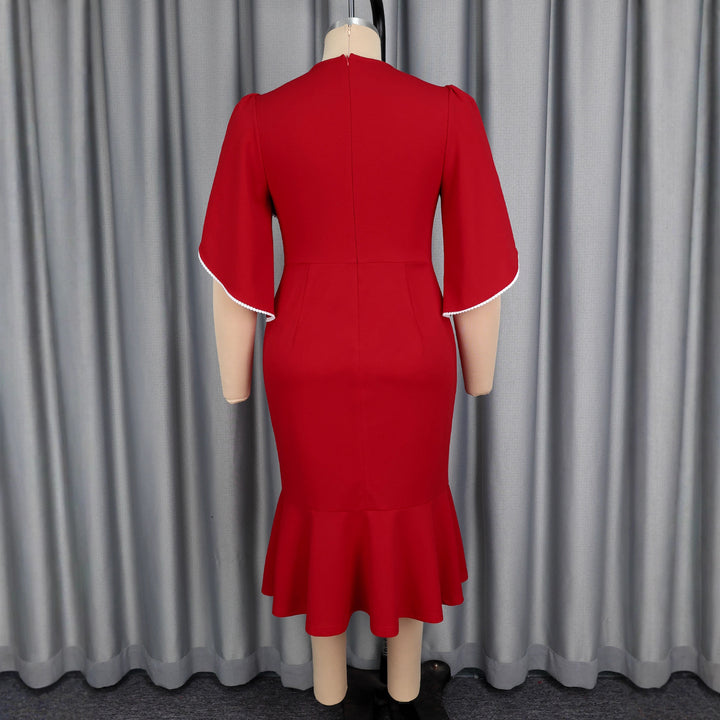 Damen figurbetontes Abendkleid mit Schößchen und voluminösem Rüschendesign Echo Archiv