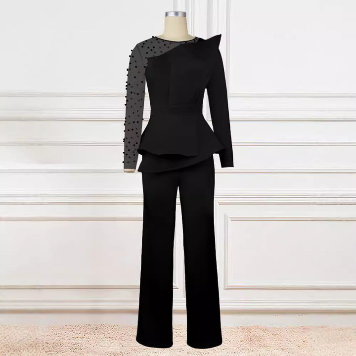 Damen Eleganter Jumpsuit mit transparenten Puffärmeln und tiefem V-Ausschnitt Echo Archiv