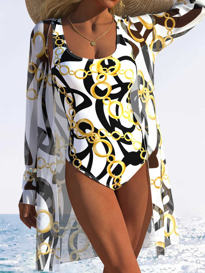 Damen eleganter Einteiler Badeanzug mit transparentem Überwurf und modernem Ringdesign Echo Archiv