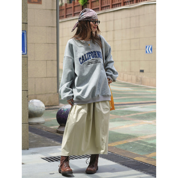 Damen Weites College‑Sweatshirt mit Rundhalsausschnitt und Statement-Print Echoarchiv