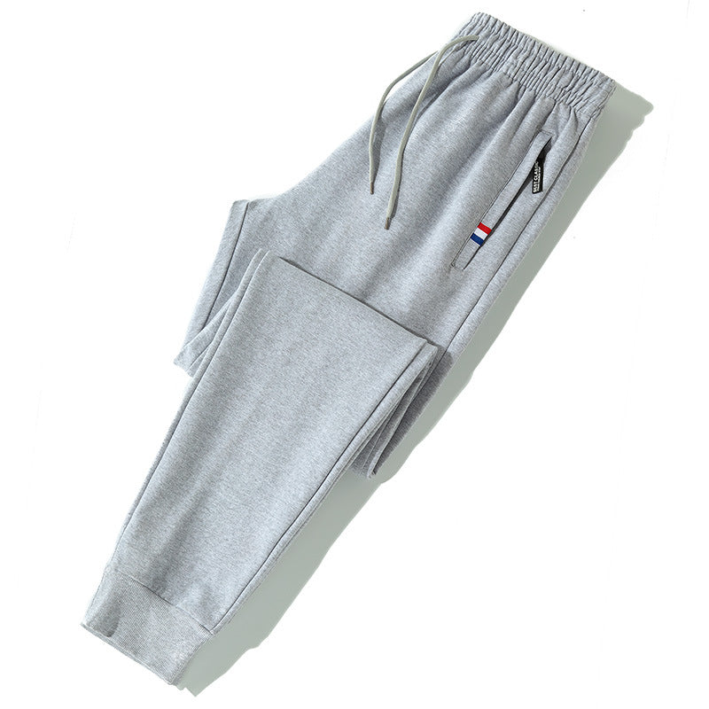 Herren Tapered-Jogginghose mit Tunnelzug, Reißverschlusstasche & Rippbündchen Echo Archiv