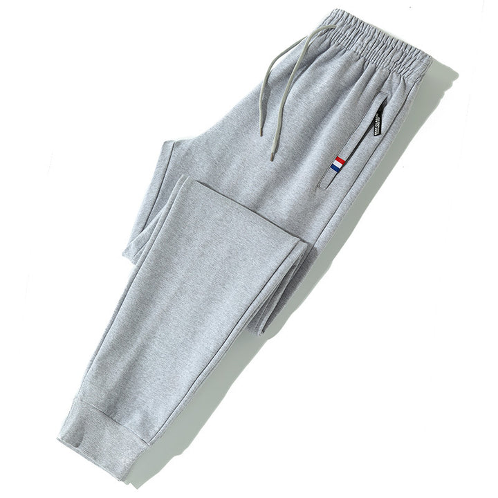 Herren Tapered-Jogginghose mit Tunnelzug, Reißverschlusstasche & Rippbündchen Echo Archiv