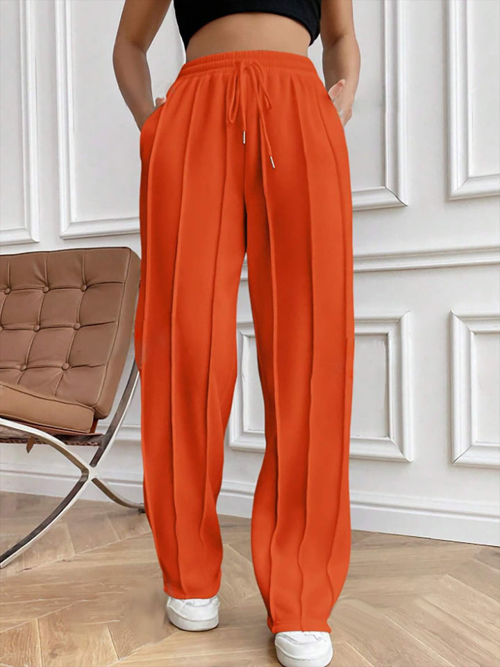 Damen Weite High-Waist Plissee-Hose mit Tunnelzug und markanter Bügelfalte Echoarchiv
