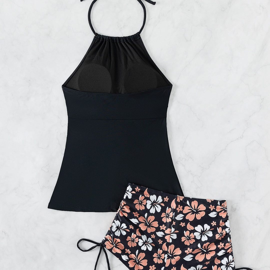 Damen Sport Top mit verstellbarem Nackenträger und floralem Muster Shorts Echo Archiv