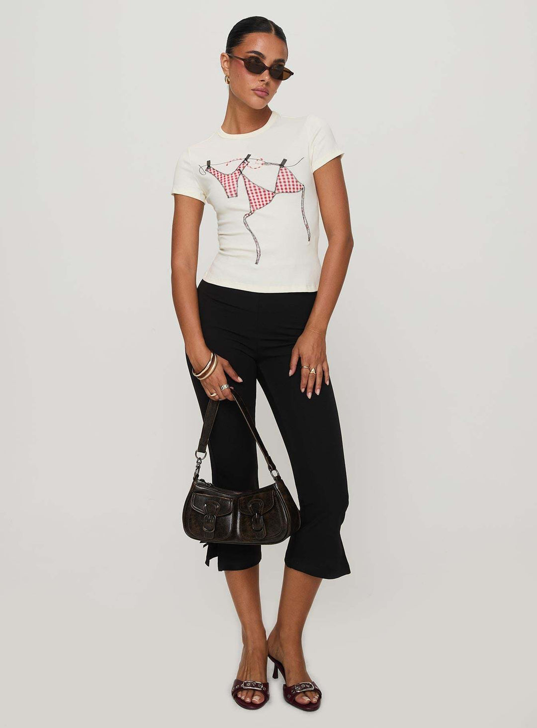 Damen T-Shirt mit kreativem Druck und figurbetontem Schnitt Echo Archiv