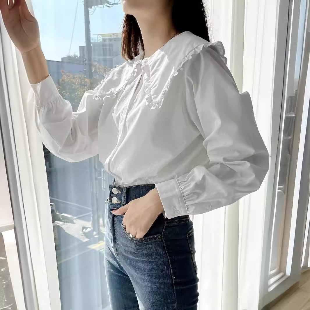 Damen Bluse mit übergroßem Rüschenkragen und fein gearbeitetem Tailoring Echoarchiv
