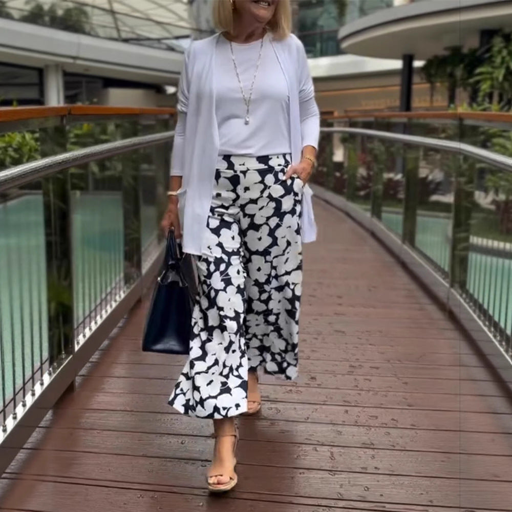 Damen nan weite Palazzohose mit großblumigem Print, hohem Bund und Eingrifftaschen Echo Archiv