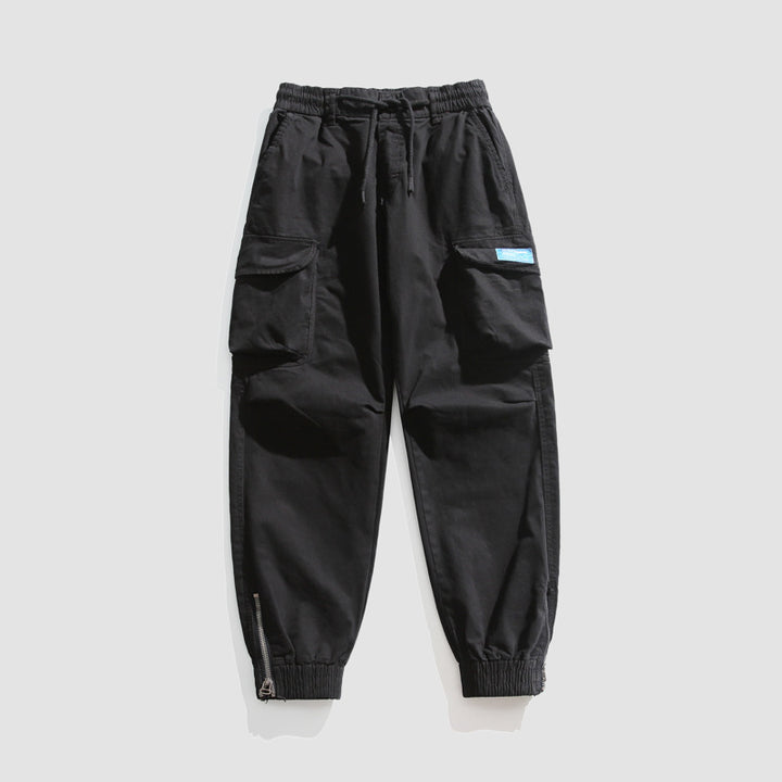 Herren Konisch geschnittene Utility-Cargo-Jogginghose mit Tunnelzugbund, Klapptaschen und Knöchelreißverschlüssen Echo Archiv