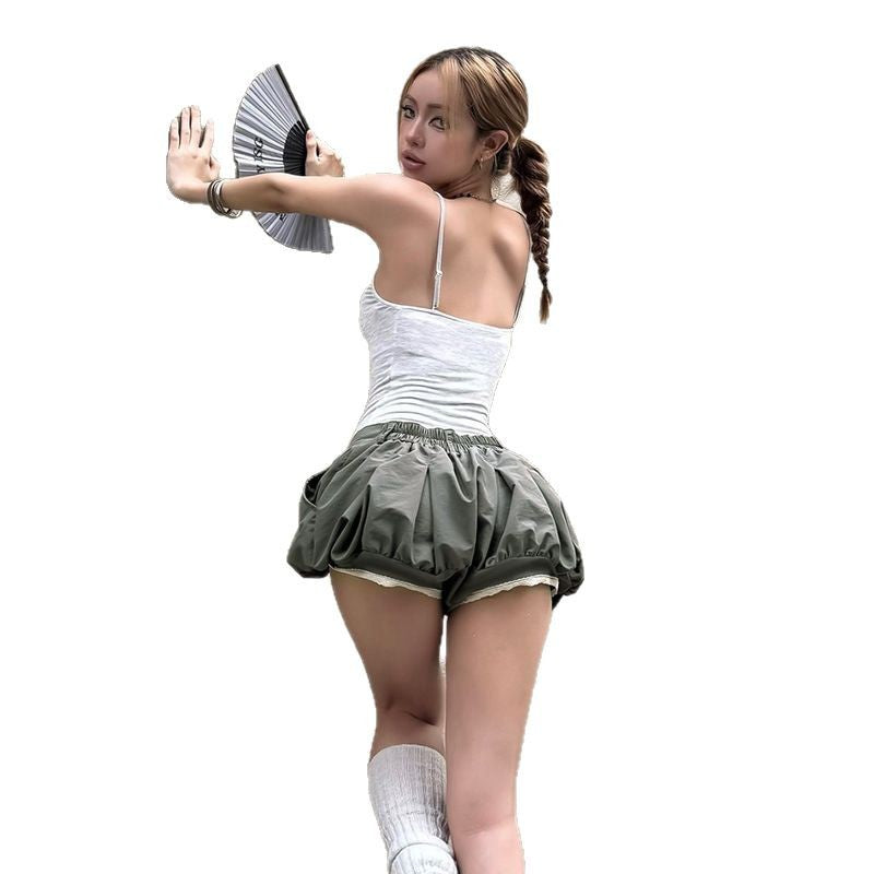 Damen modische Ballonshorts mit flatterndem Schnitt und dekorativen Knöpfen Echo Archiv
