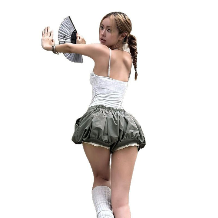 Damen modische Ballonshorts mit flatterndem Schnitt und dekorativen Knöpfen Echo Archiv
