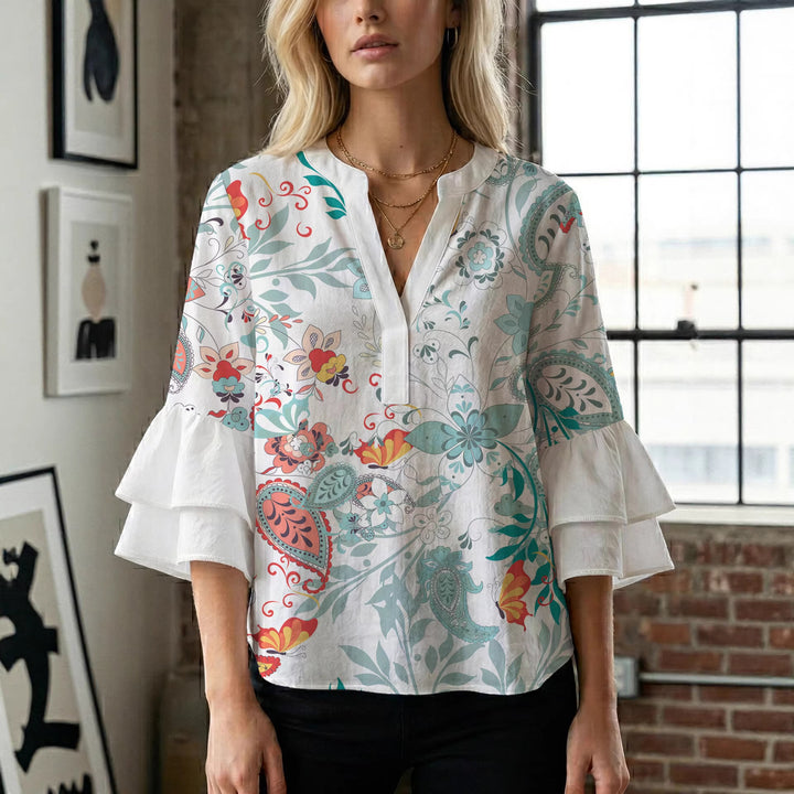 Damen elegantes Oberteil mit voluminösen Rüschensäumen und floralem Design Echo Archiv