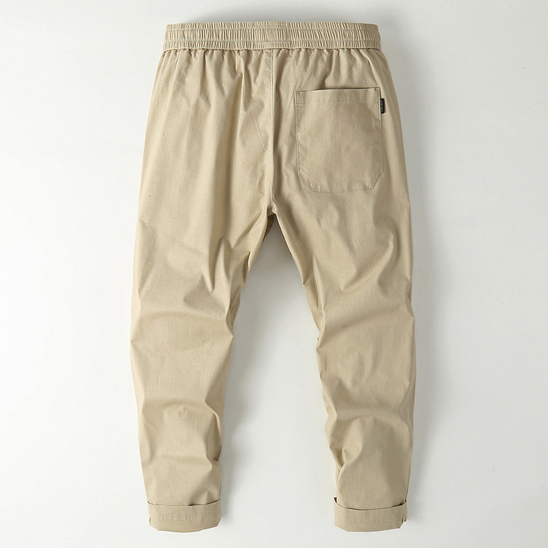 Herren Elastische Chino-Jogger mit tailliertem Tapered-Schnitt und aufgesetzter Gesäßtasche Echoarchiv