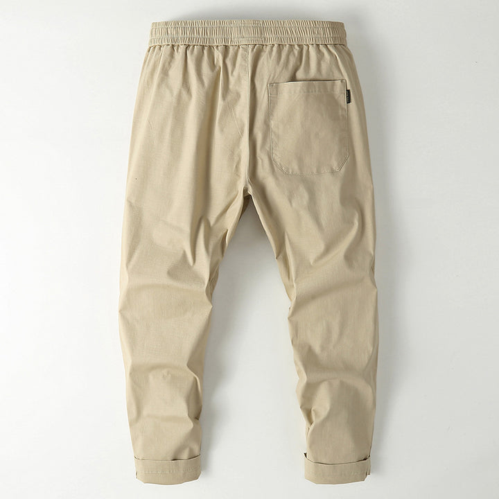 Herren Elastische Chino-Jogger mit tailliertem Tapered-Schnitt und aufgesetzter Gesäßtasche Echoarchiv