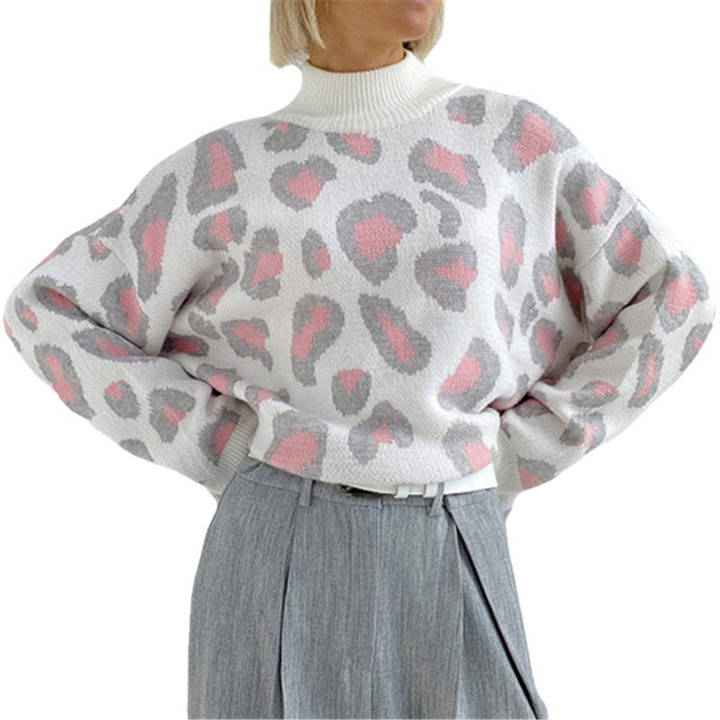 Damen Oversize Rollkragenpullover mit Leo-Jacquard und Rippbündchen Echoarchiv