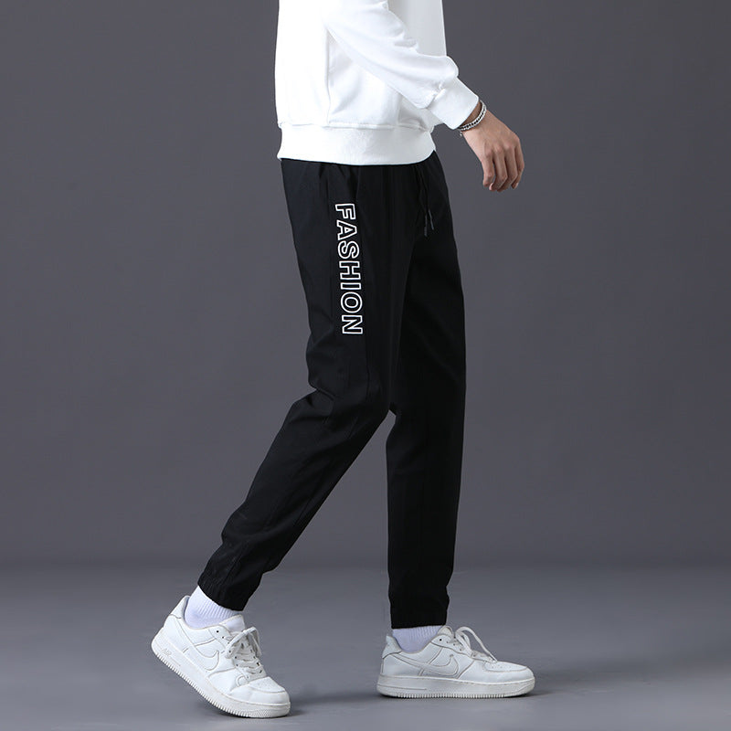 Herren modische Jogginghose mit elastischem Bund und seitlichen Taschen Echoarchiv
