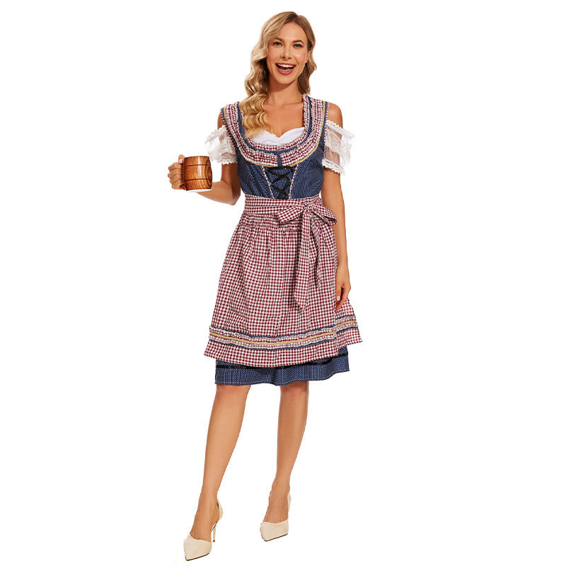 Damen nan traditionelles Trachtenkleid mit Schnürmieder, Spitzenärmeln und karierter Schürze Echo Archiv