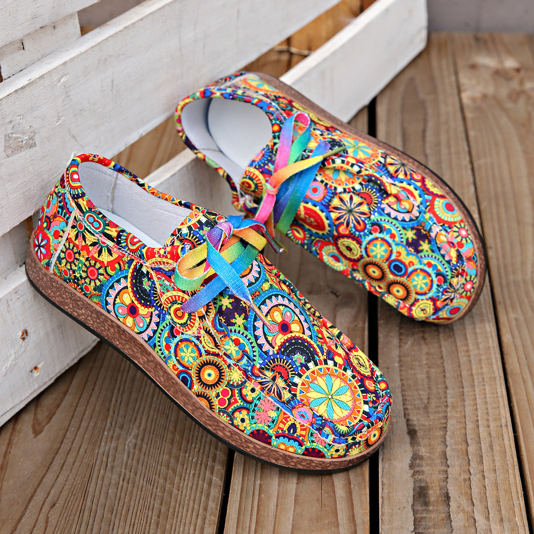 Damen Bequeme Plateau-Slipper im Ethno‑Print mit Korkoptik‑Sohle Echo Archiv