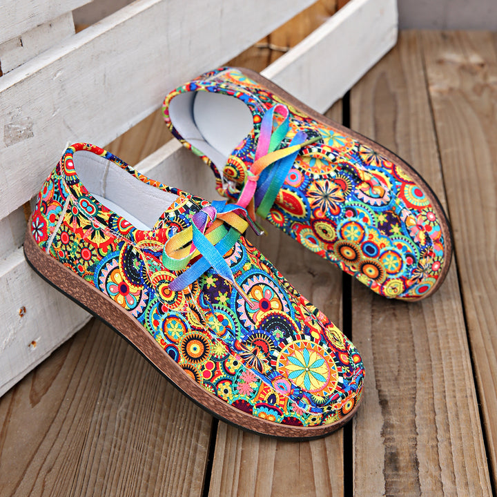 Damen Bequeme Plateau-Slipper im Ethno‑Print mit Korkoptik‑Sohle Echo Archiv