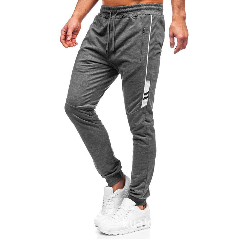 Herren Sportliche Jogginghose mit seitlichen Reißverschlüssen und elastischem Bund Echoarchiv