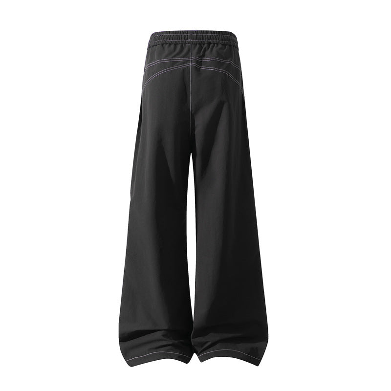 Herren Weite Cargo‑Hose mit Tunnelzugbund, Utility‑Nähten und Reißverschluss‑Taschen Echo Archiv